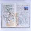 6280 - Daniel Escobar, ''Atlas de Anatomia Urbana 90-95'', recortes sobre guia turístico de Belo Horizonte, 21 x 23 x 2,5 cm, ass. dt. 2016